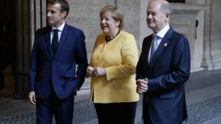 Merkel stellt Scholz in Rom als Wahrscheinlichen Nachfolger vor