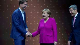 Merkel nimmt bei Eröffnung der Automesse IAA die Branche in die Pflicht