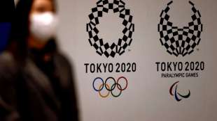 Zuschauer in Tokio: Entscheidung womöglich erst im Juni