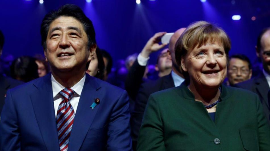 ECONOMY: Kanzlerin Merkel und Premier Abe wollen freie M