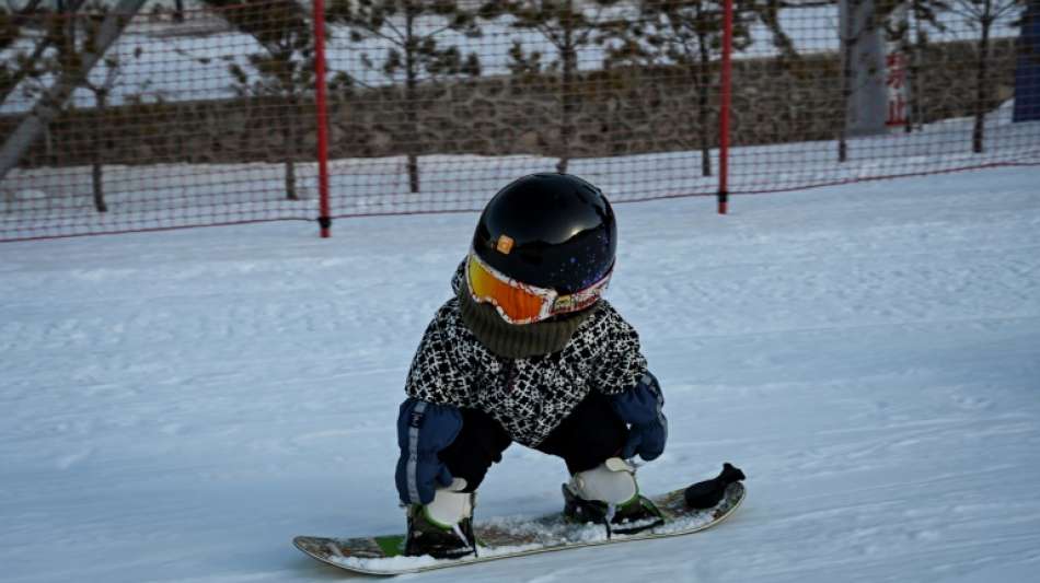 Snowboardfahrendes Baby in China ein Internethit
