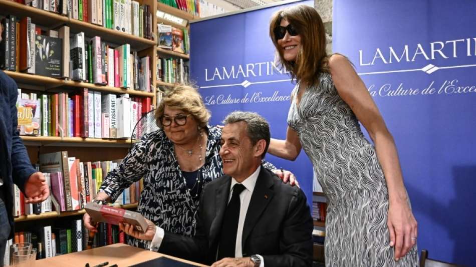 Sarkozy auf Foto deutlich größer als Carla Bruni
