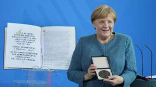Merkel fordert Einsatz gegen Rassismus und Antisemitismus "mit aller Konsequenz"