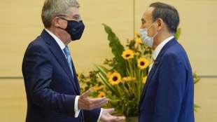 Gespr&auml;ch mit Bach: Japans Premier Suga nimmt IOC in die Pflicht