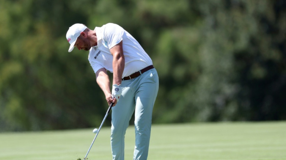  'Solid' Clark takes solo lead at BMW Championship 
