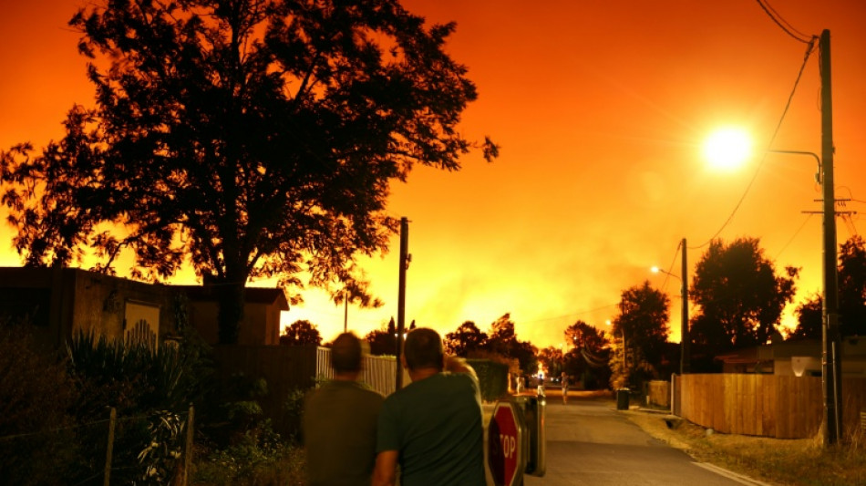  France evacuates thousands of tourists as fire rages in pine forest 