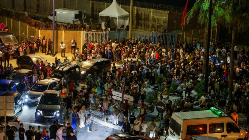  Thousands cross into Spain's north Africa enclave in new migrant crisis 