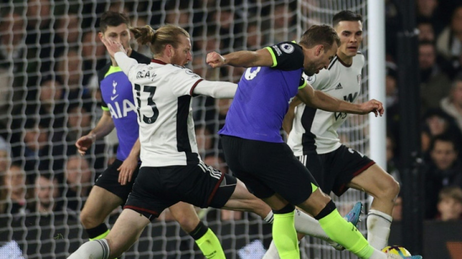 Kane sinks Fulham to become Spurs' joint record scorer
