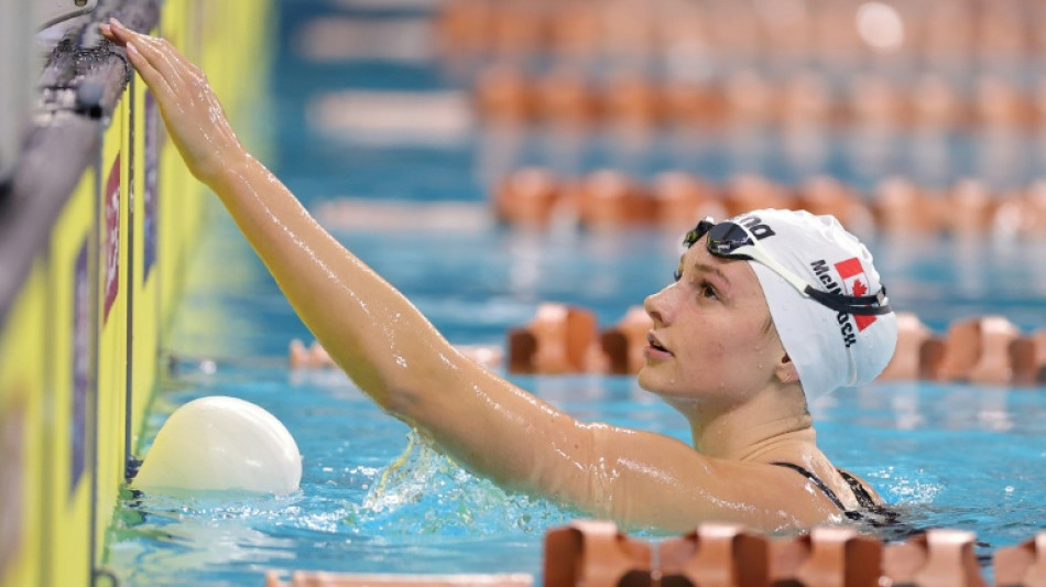  Canada's McIntosh breaks 200 fly world record, oldest in women's swimming 
