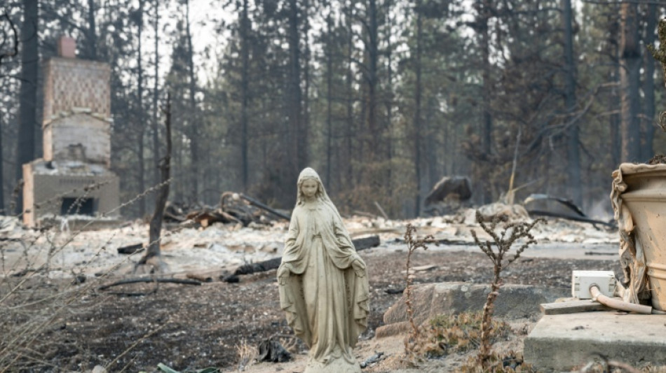  US northwest battles wildfires after Spokane neighborhoods scorched 