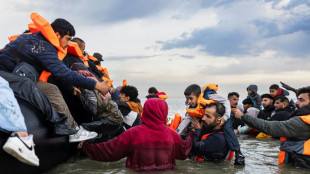 UK sees record asylum claims as row brews over housing