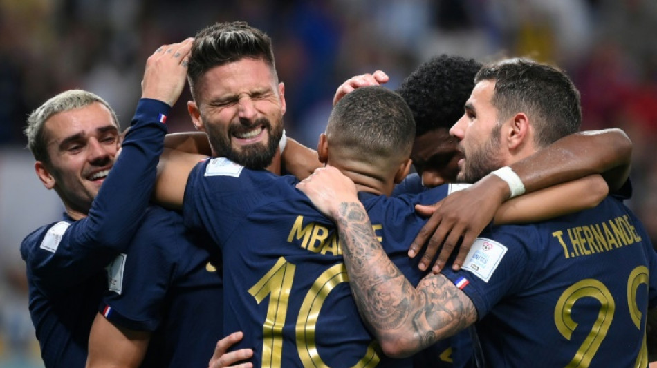 Giroud equals Henry mark as World Cup holders France sink Australia 