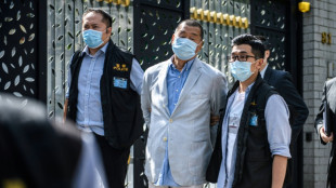 Hong Kong journalists face 'precarious' future after Jimmy Lai jailed