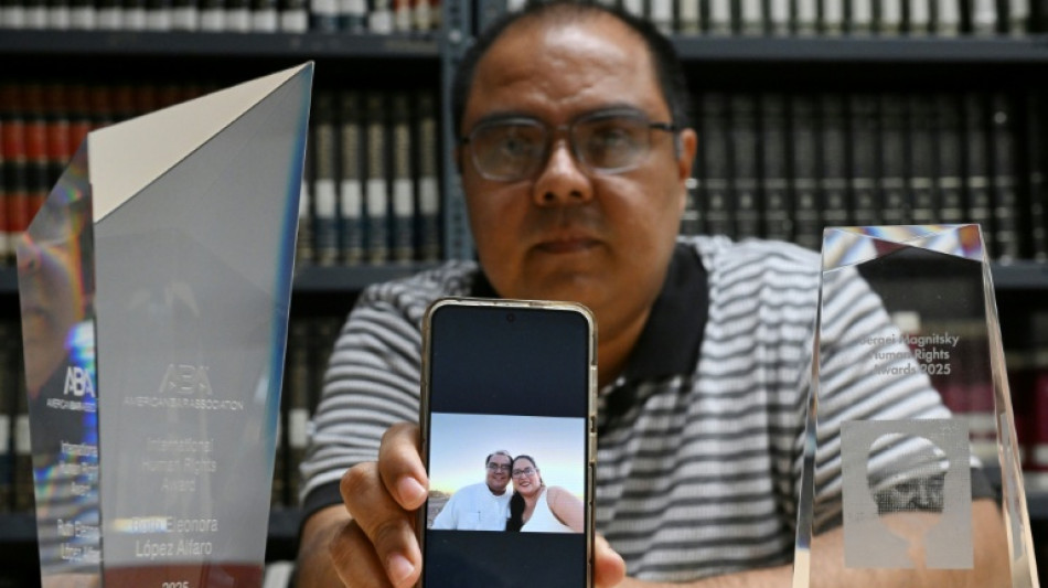  Salvadoran anti-corruption lawyer jailed to 'silence her', husband says 