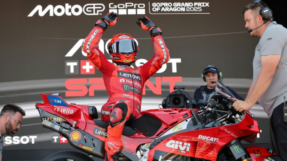 Marc Marquez wins sprint to extend lead in title race