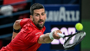 Djokovic 'hangs by rope' before battling into Shanghai last 16 