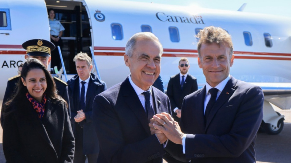  Macron welcomes Canada's Carney to French Atlantic territory 