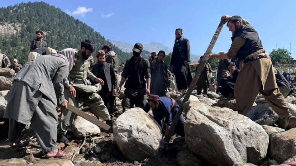  Afghans search for dozens missing after devastating flood 