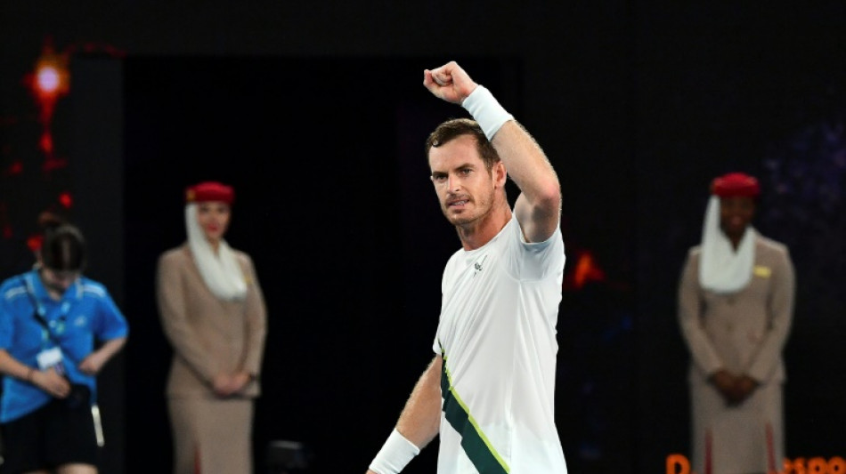 Murray wins Australian Open five-set epic after heat stops play