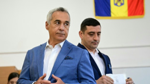 Romanians return to polls as far right hopes to win presidential rerun