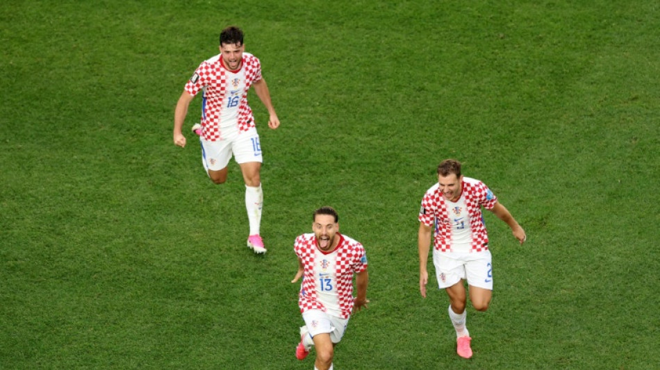  Croatia battle past Ghana to sew up World Cup Last 32 spot 