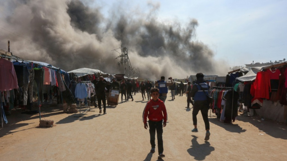 Macron, Abbas call for Gaza truce as Hamas insists on guarantees