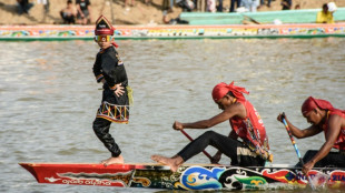 Indonesian child's viral fame draws tourists to boat race