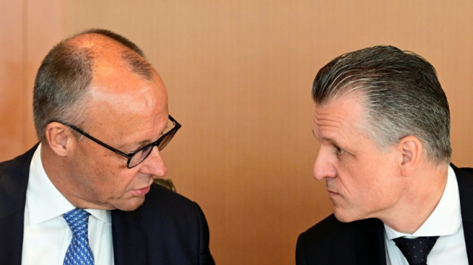  Germany's Merz under fire over chaotic reshuffle 
