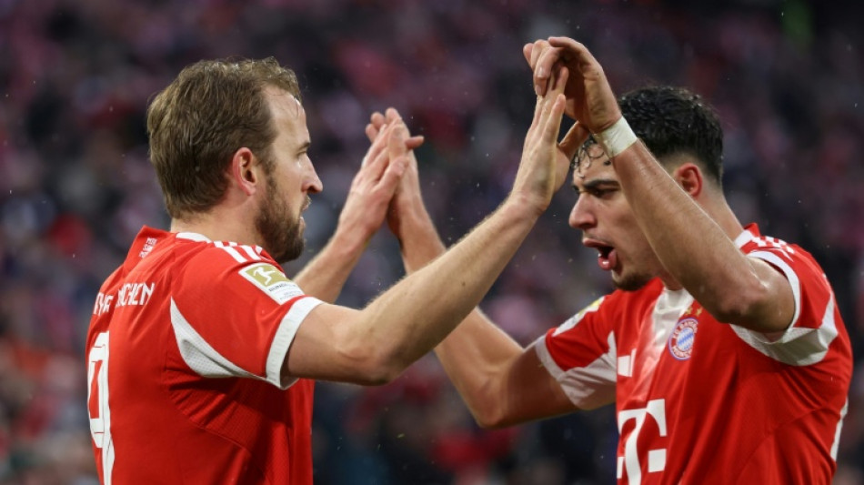 Kane nets double as Bundesliga leaders Bayern beat Frankfurt