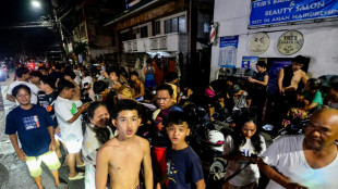 Strong quake in central Philippines kills 26 as search ongoing
