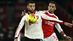 Arsenal miss chance to stretch lead in Liverpool stalemate