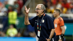 Bielsa accepts blame for World Cup exit, but says Uruguay deserved more