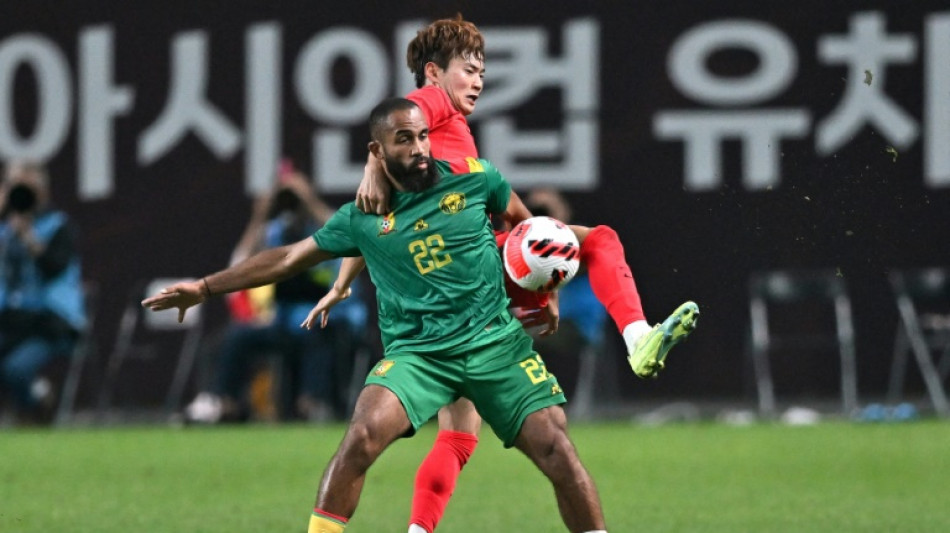 Son's header lifts South Korea past Cameroon