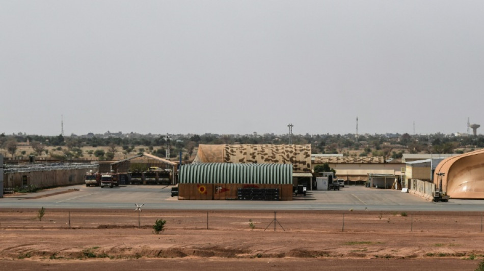  Soldiers' mutiny rocks Niger capital, as junta claims to be back in control 