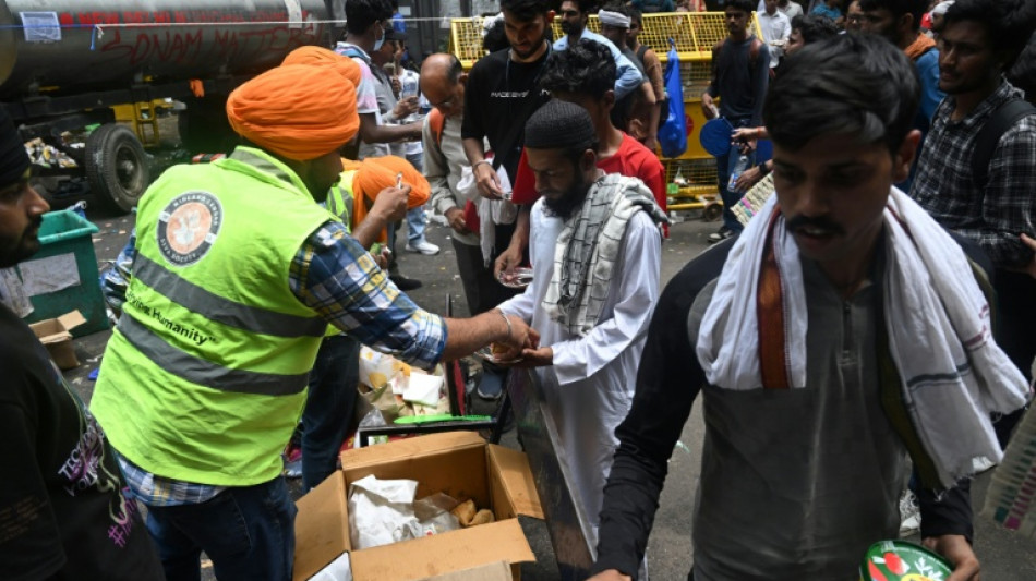  Supporters flood India's 'cockroach' protesters with food 