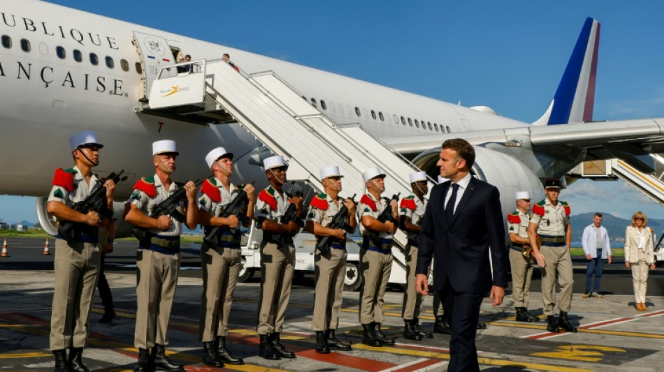 Macron vows to step up reconstruction in cyclone-hit Mayotte