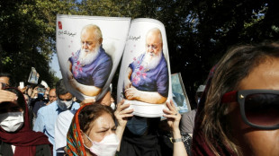 Iranians pay homage to poet Ebtehaj, dead at 94