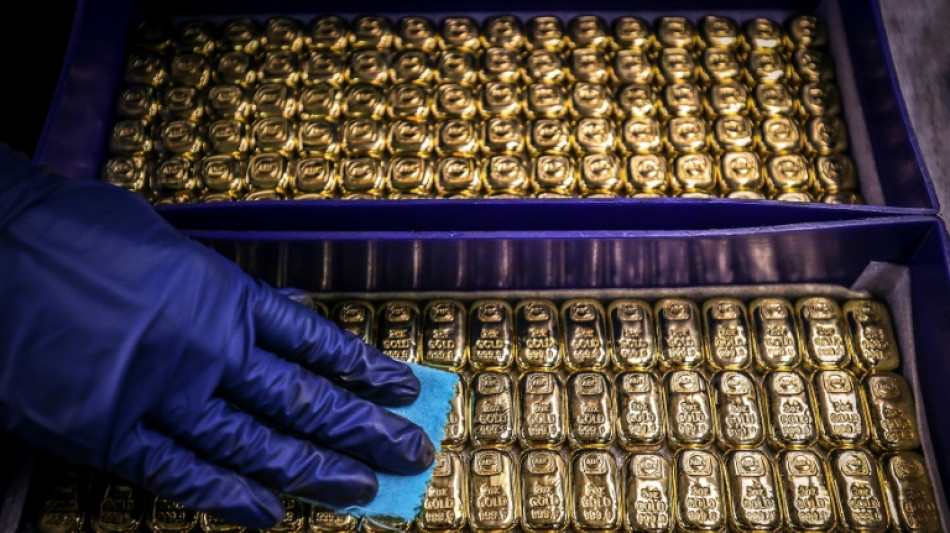 Stocks rise on tech tariffs respite, gold hits new high