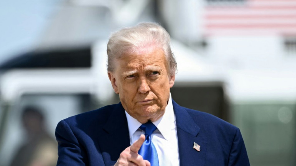 Trump defends resettling white South Africans as refugees in US
