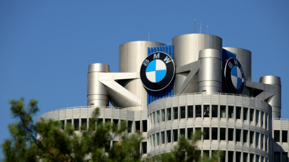  BMW profit down a third as carmaker plans job cuts 