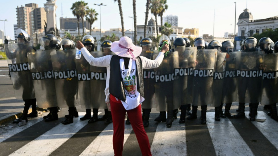 Protesters brave tear gas to demand ouster of Peru's embattled leader