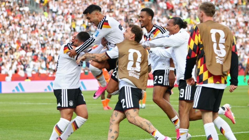  Germany into World Cup last 32 after late comeback, Dutch thrash Sweden 