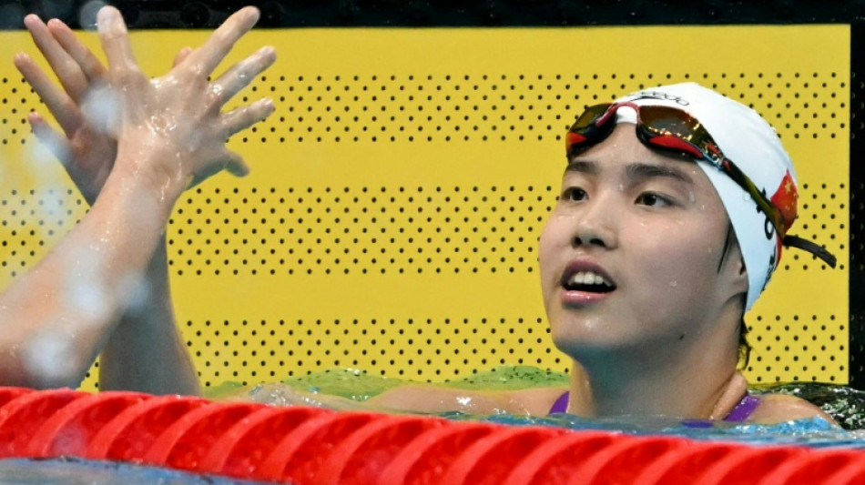  China prodigy wins third Games gold as North Korea weightlifters roar 