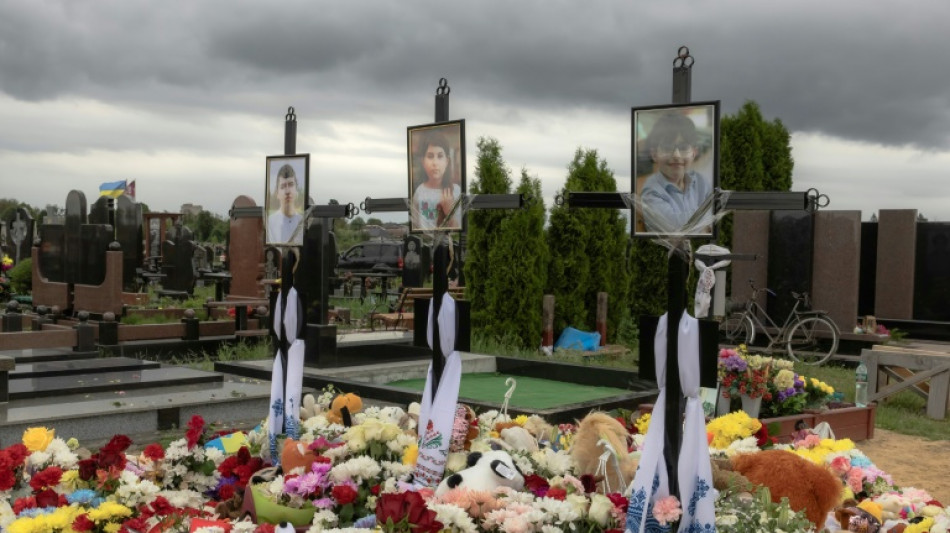Ukrainian town mourns three siblings killed in Russian strike