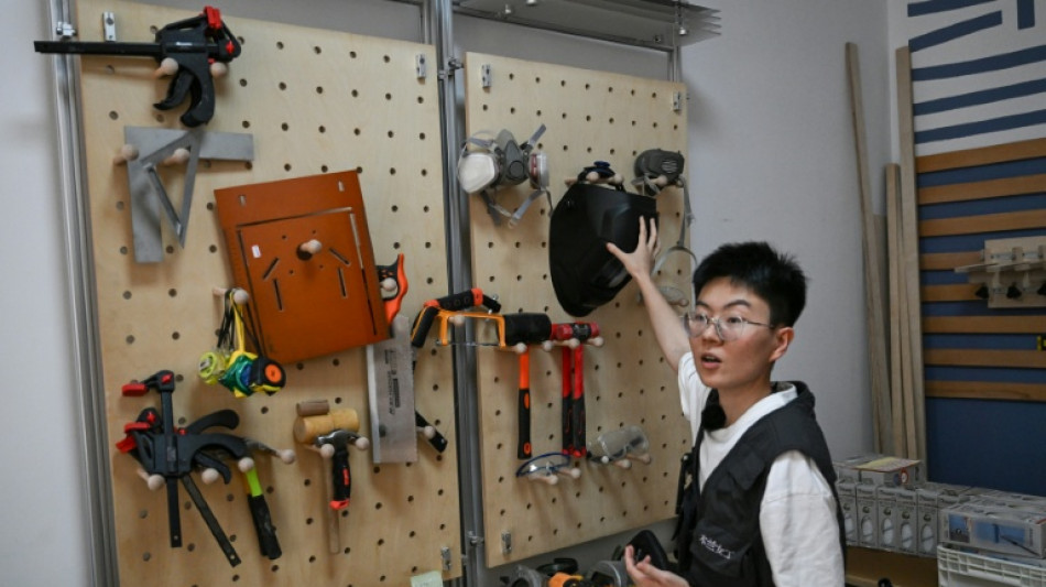  Chinese repairwomen smash stereotypes with power tools 