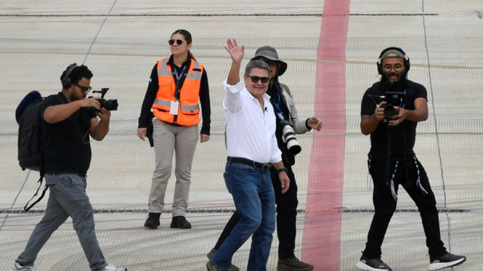  Honduran ex-president returns home after Trump pardon 