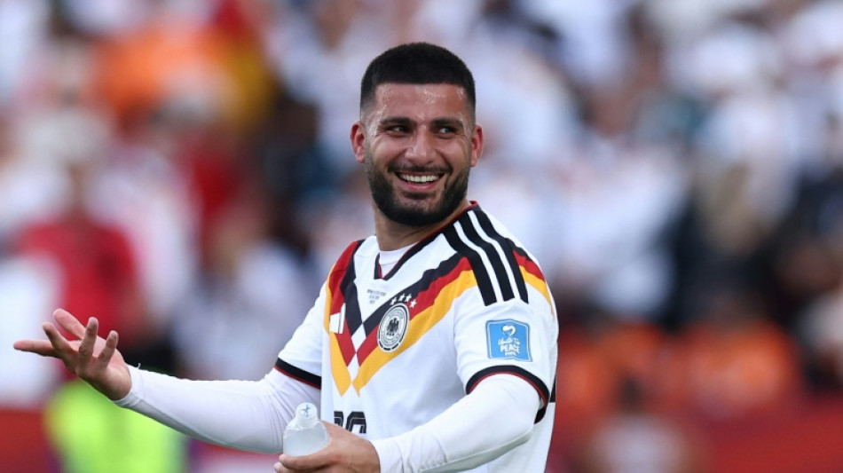  Germany come from behind to beat Ivory Coast and reach World Cup last 32 