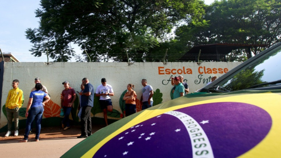  Brazil votes in tight election as Lula slams polling obstacles  