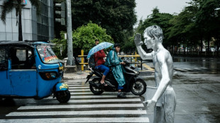 A Jakarta, des "hommes d'argent" qui en voient rarement la couleur