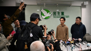 Members of Hong Kong's Democratic Party approve plan to disband